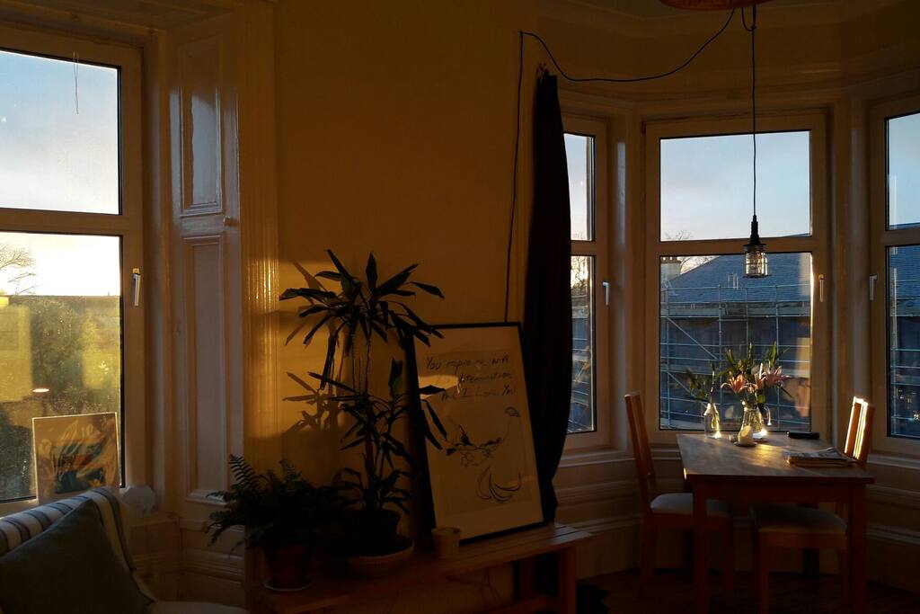 The living room offers wonderful views and day long sun