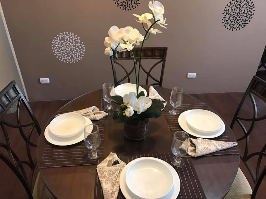 The Dining Table. Guests can devour a scrumptious meal using the utensils provided.