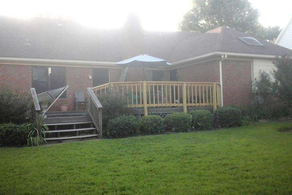 This is the deck on the back of the house. It is available for your use. It extends further left across the entire width of the house.