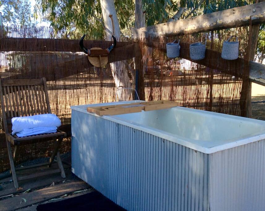 Have an outdoor artesian bath under the stars