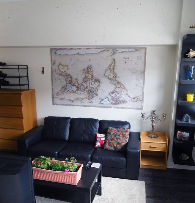 Living room area. There is AC and heat with temperature control. I pay for utilities, but it's efficient so I don't mind if you can crank up the heat or AC :)