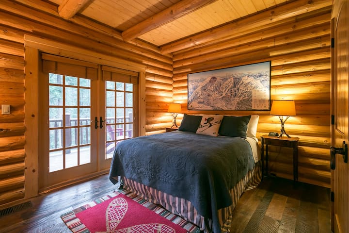 Ski-themed bedroom on main floor with private balcony