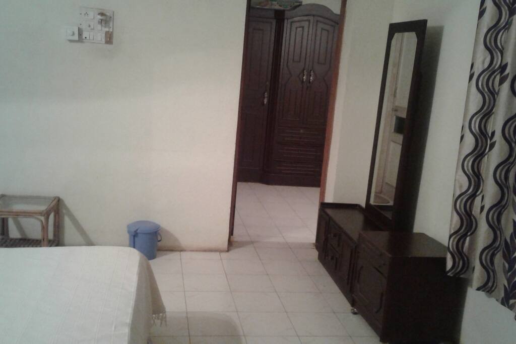 Smaller Guest Room with Sofa and Cupboard.