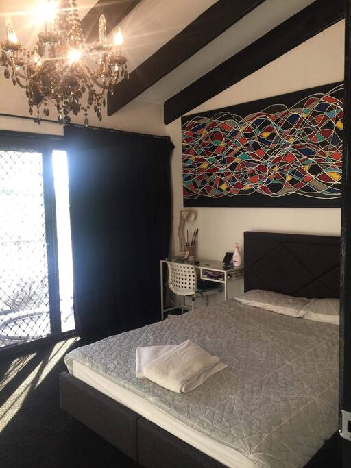 Main bedroom with balcony and contemporary Art Deco in the bedroom