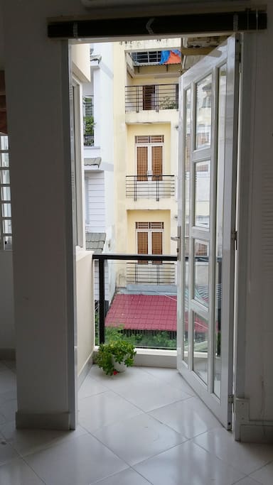 Private small balcony overviewing the small street