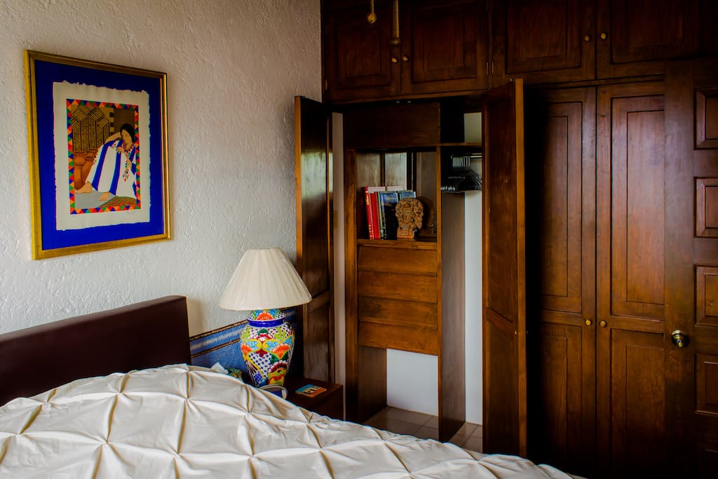 This guest bedroom comes with lots of storage and closet space.