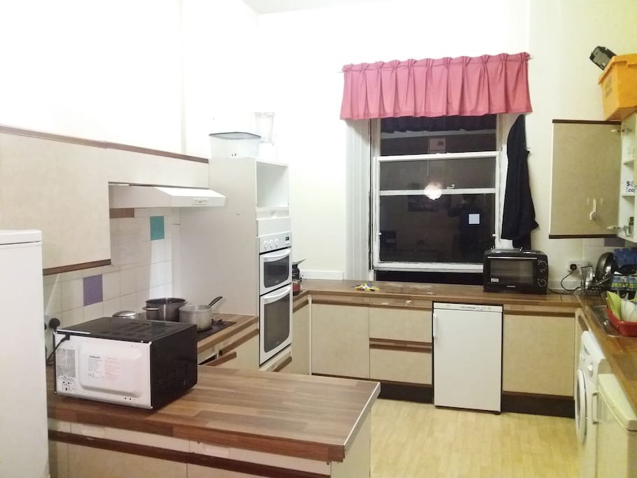 The kitchen, fully furnished and ready to be utilised for all your cooking needs.
