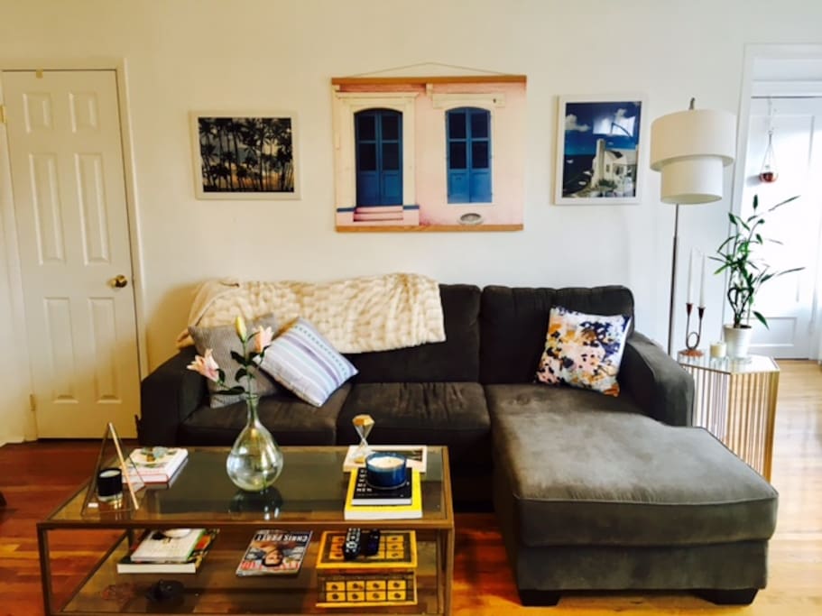 Large and comfy L-shaped couch, perfect for an extra guest