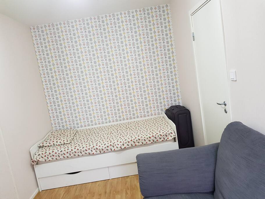 Single bed with drawers for personal belongings