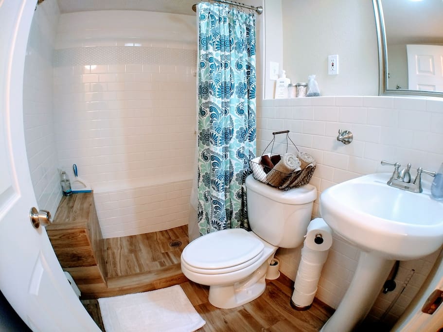 Enjoy a refreshing shower in our modern bathroom, stocked with lotion, cotton balls, and q-tips as well as shampoo, conditioner, and body wash.