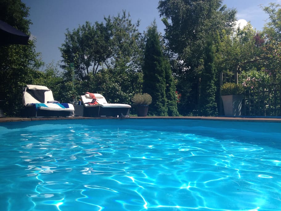 Spend balmy days relaxing by the pool.