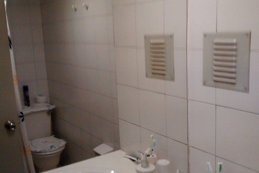 Baño con tina y ducha