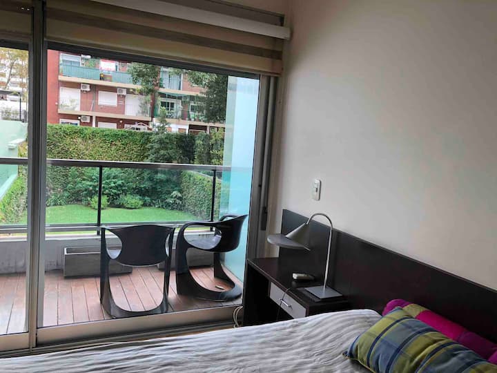 Loft apartment with garden and pool view in Belgrano