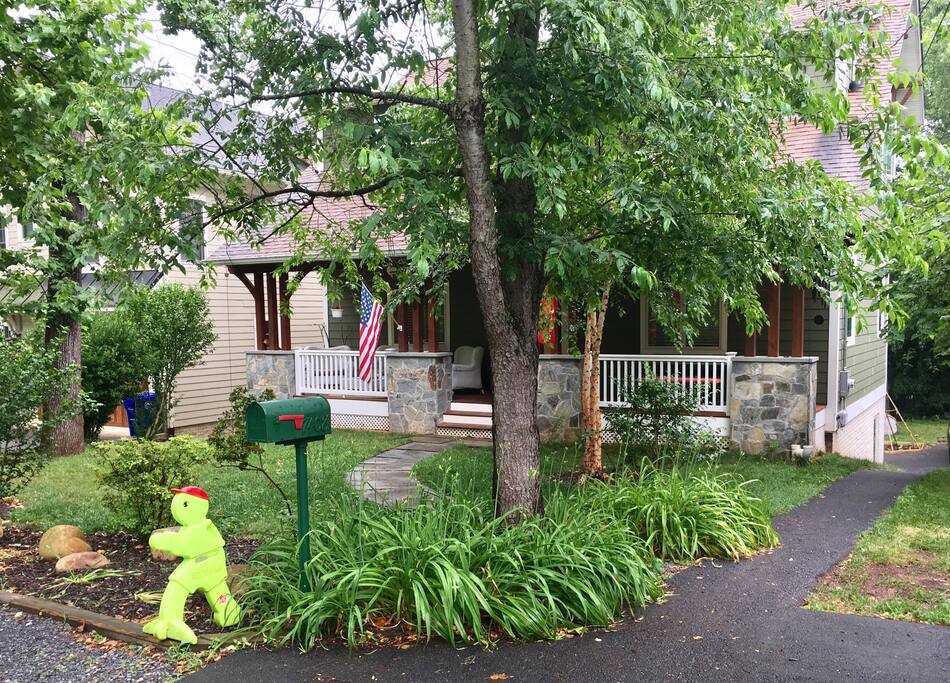 Picture of the front our home, to reach the apartment follow the driveway on the right down toward the backyard. The private entrance is on the left next to the garage door.