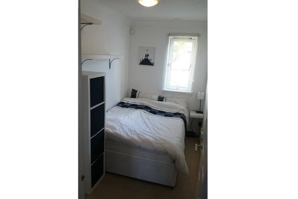 Double Bed and storage in room
