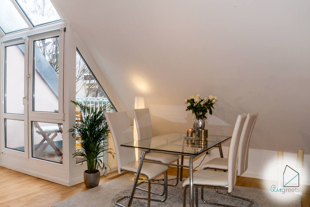 The dining room offers a big table to enjoy your homecooked meals.