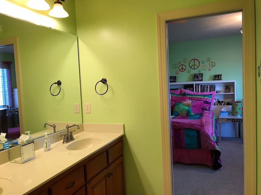 Double sinks in between the two bedrooms.