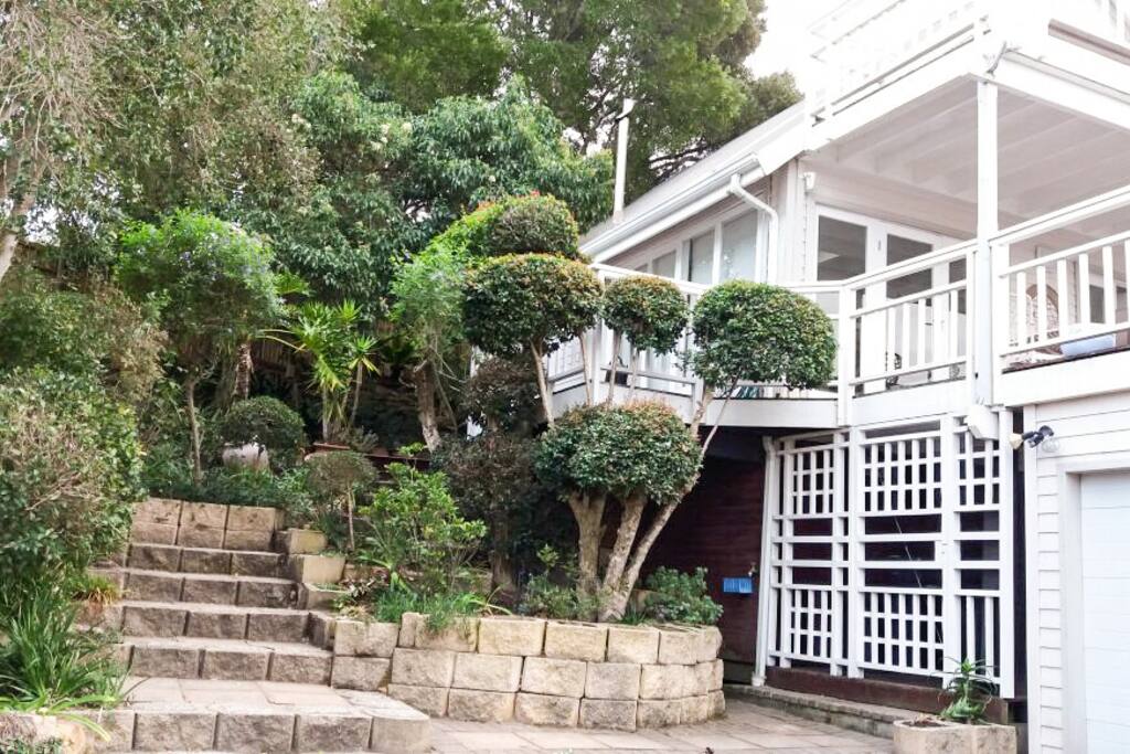 The house has two electrically operated garages, as well as additional parking area inside the fenced property