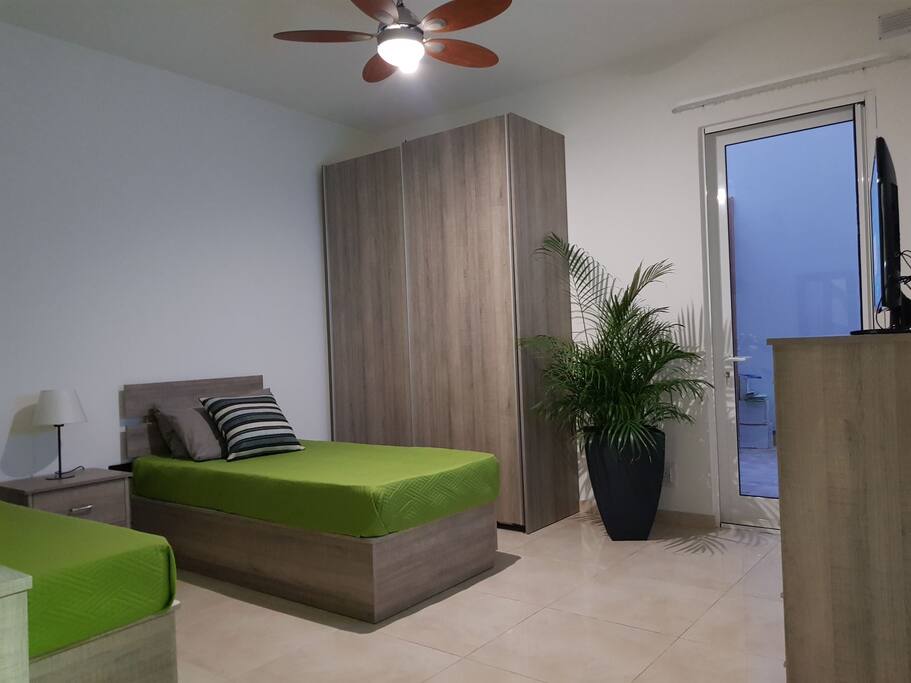 one of the bedrooms that can be used as double bed or 3 single.