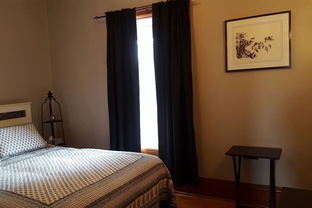 Blackout curtains and a comfortable bed ensure a good night's sleep.
