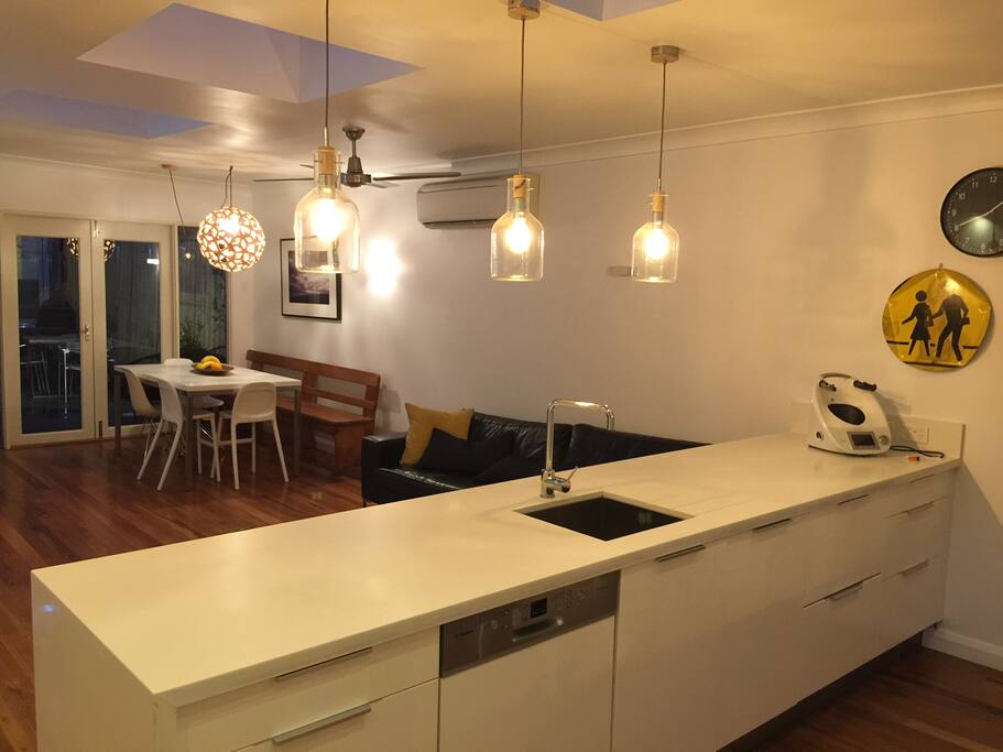 The kitchen opening to the living and dinning area.