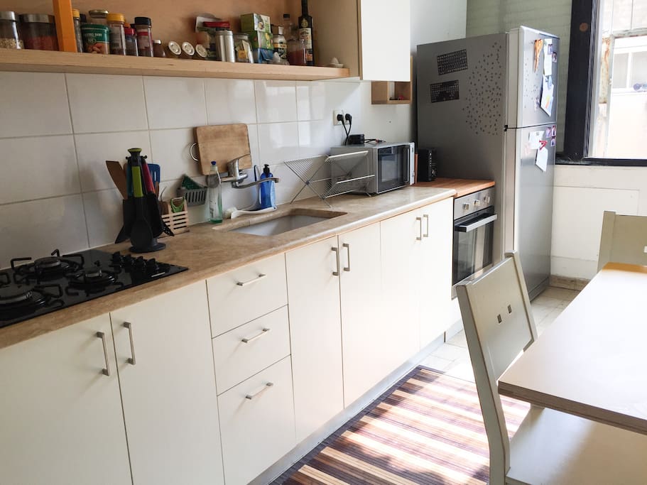 Kitchen- includes: oven, microwave, cold/hot water bar