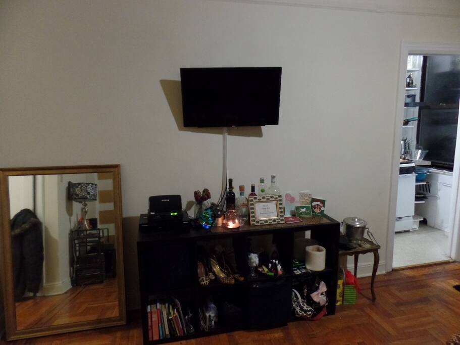 television that can be viewed from couches or bed! (tv includes netflix & hulu)