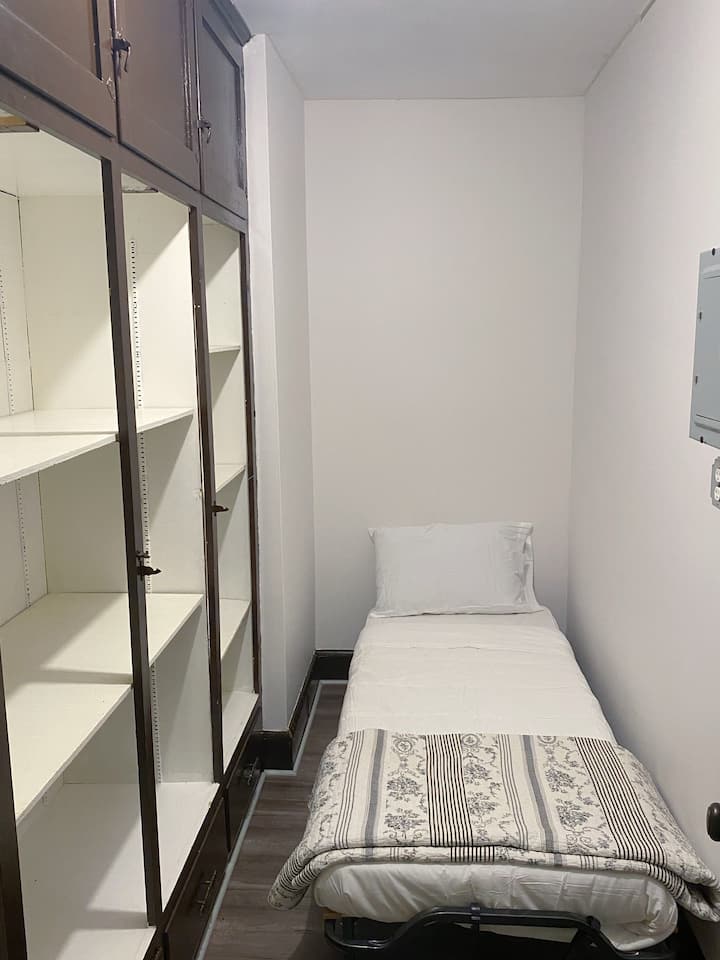 Comfortable twin size bed in addition room for an extra guest with lots of closet space 