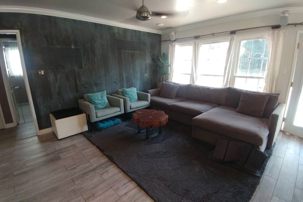 Most up to date photo of the cozy living room. Lots of seating