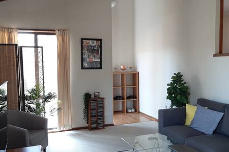 Light and roomy townhouse, close to shops.