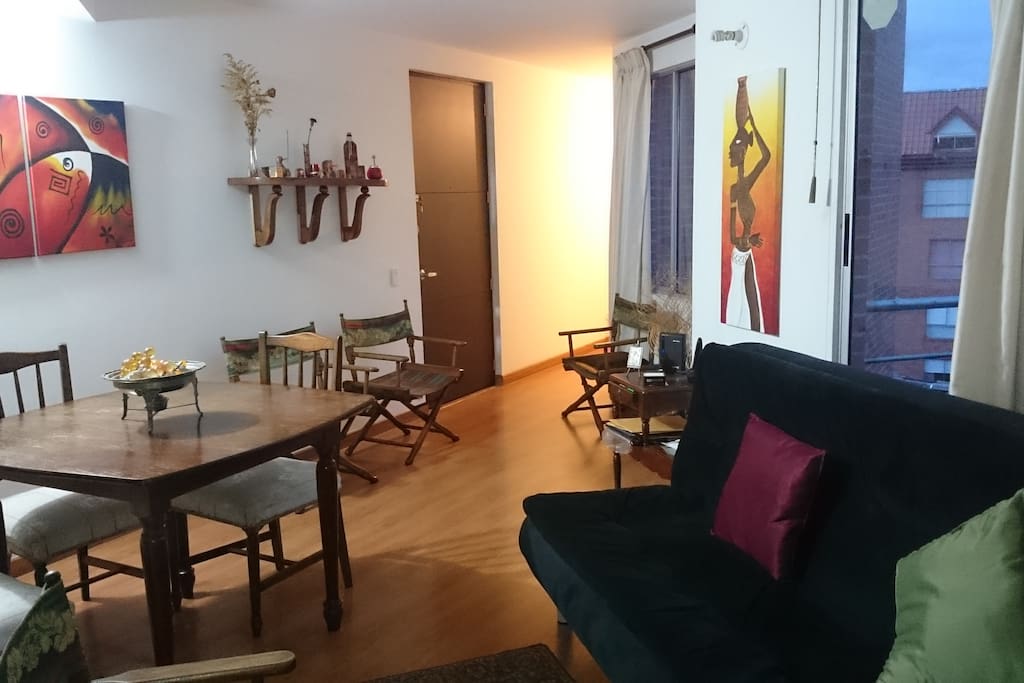 Living/dining room with a double sofa-bed