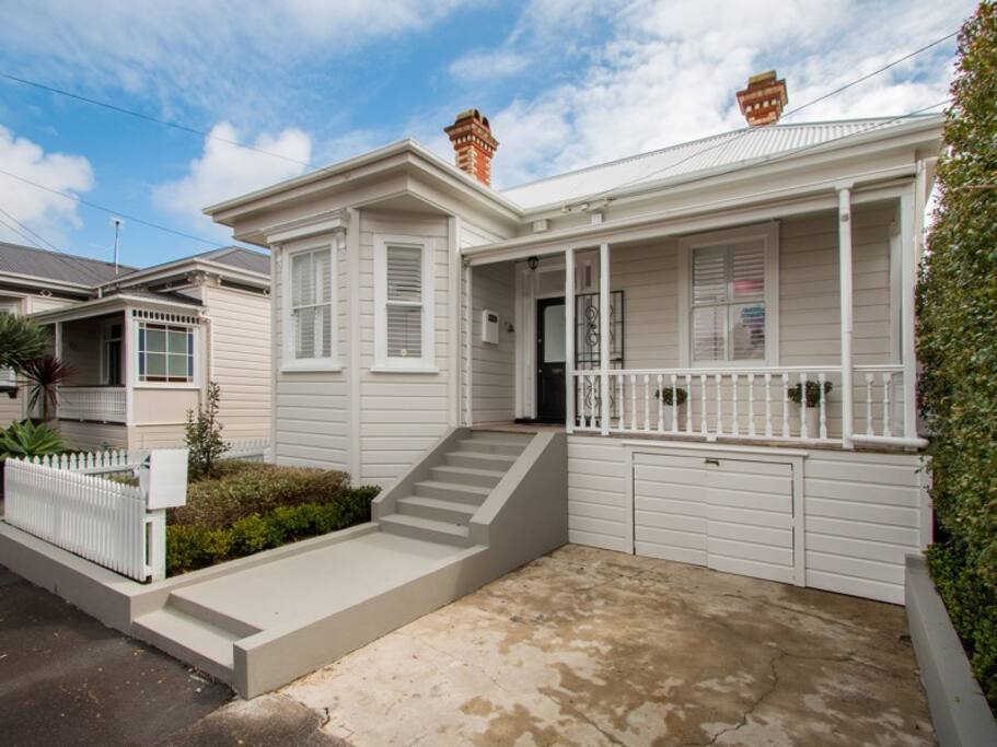 Front showing car park, classic transitional single bay
villa