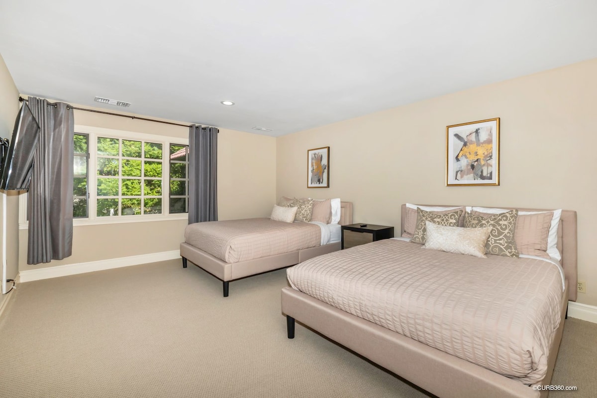 Second Level: Bedroom 3, 2 Queen beds with attached full bath,  Smart TV includes Hulu w/ Live TV, ESPN+ & Disney. Sleeps 4 total.