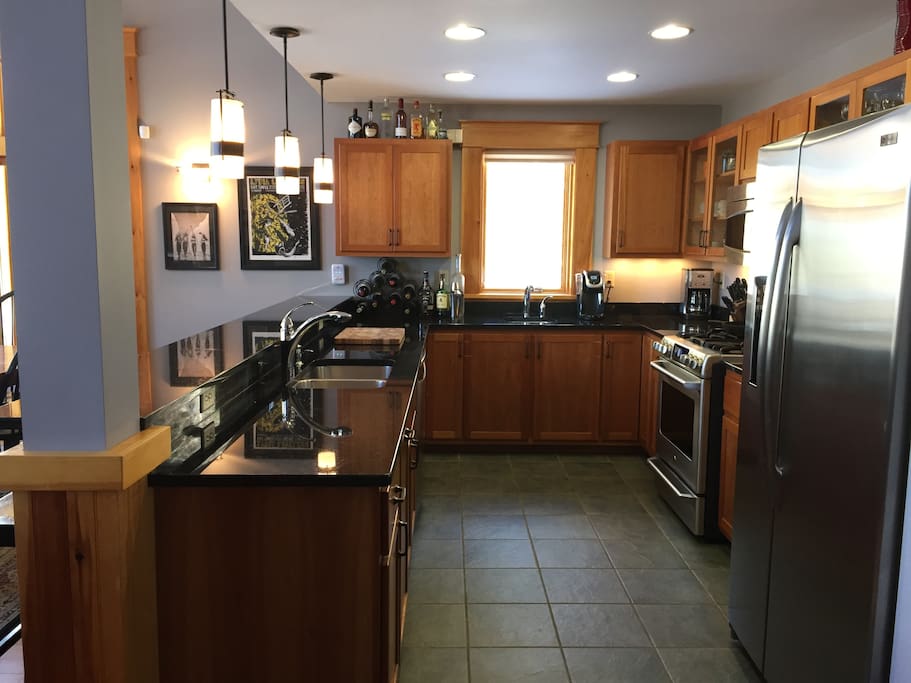 kitchen with granite countertops and cherry cabinets