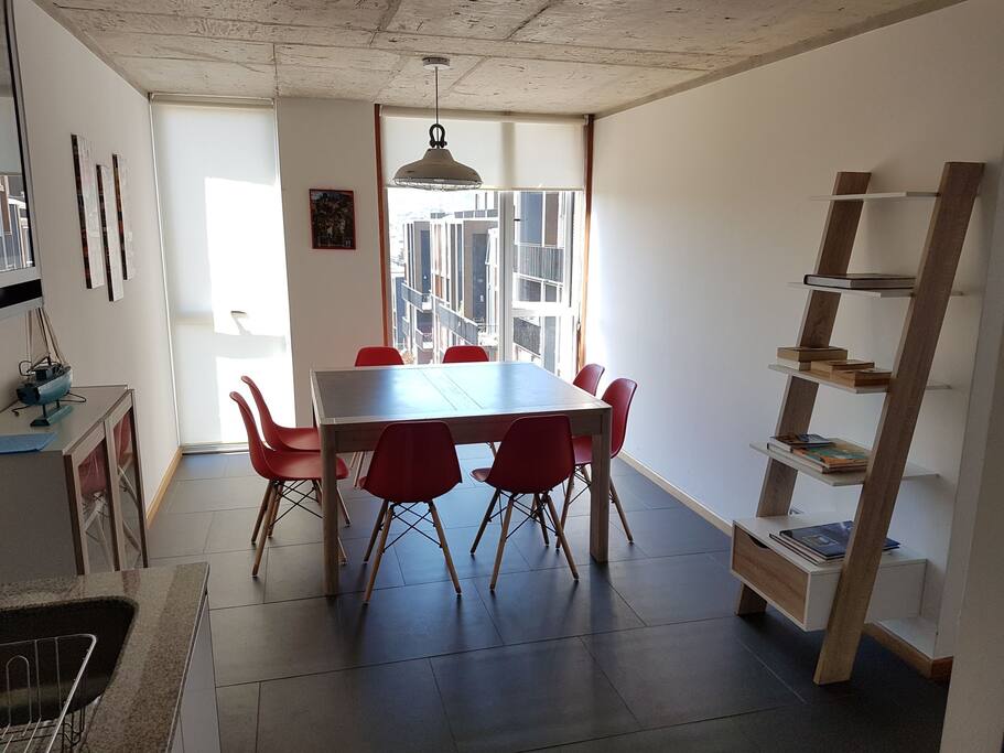 Dinner room with integrated kitchen