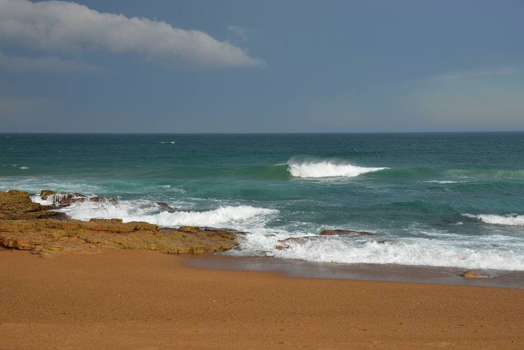Sea in front of house