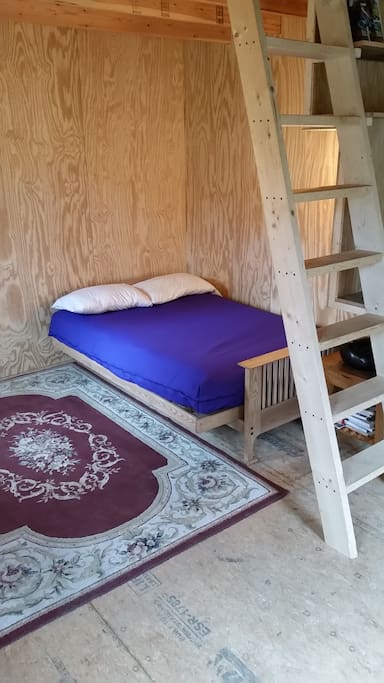 Full sofa / bed first floor. Steep ladder to loft with full futon mattress.
