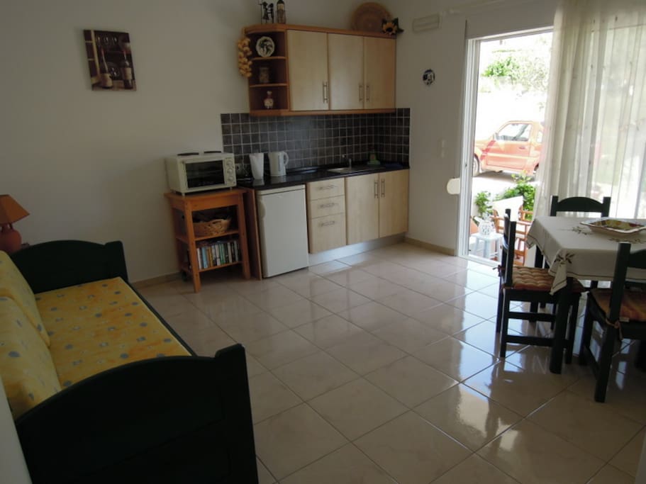 Spacious living room/kitchen, with sofa bed that converts to 2 singles, with real mattresses.
