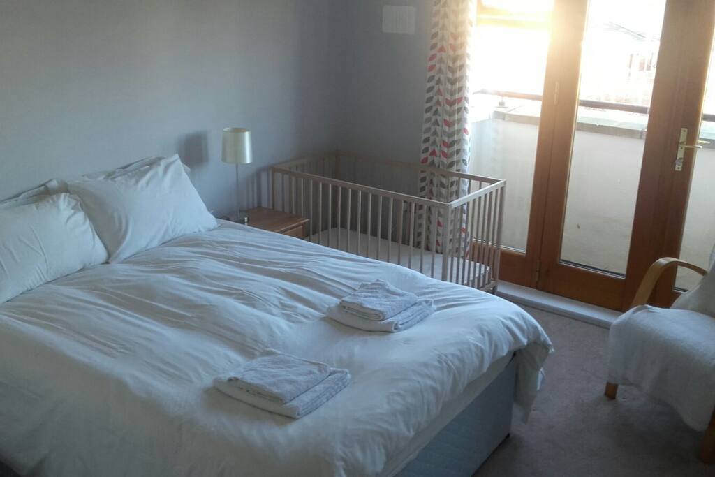 Main bedroom with double balcony doors