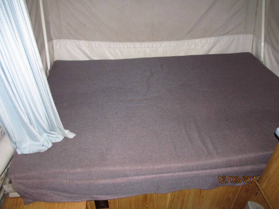 Nicely padded twin bed (sleeps one) or two kids.