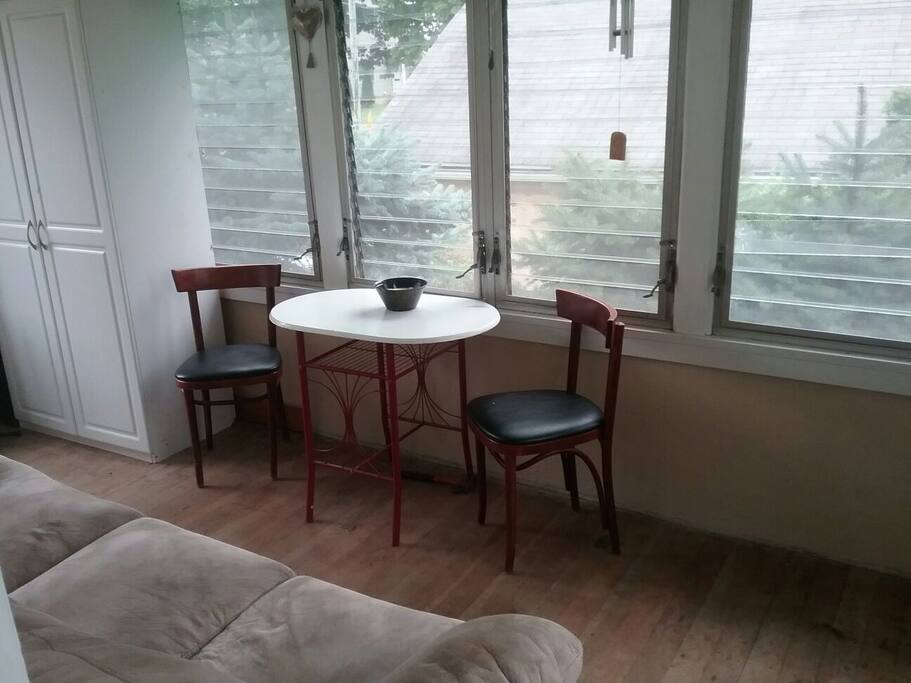 Cozy screened in porch for morning tea or coffee