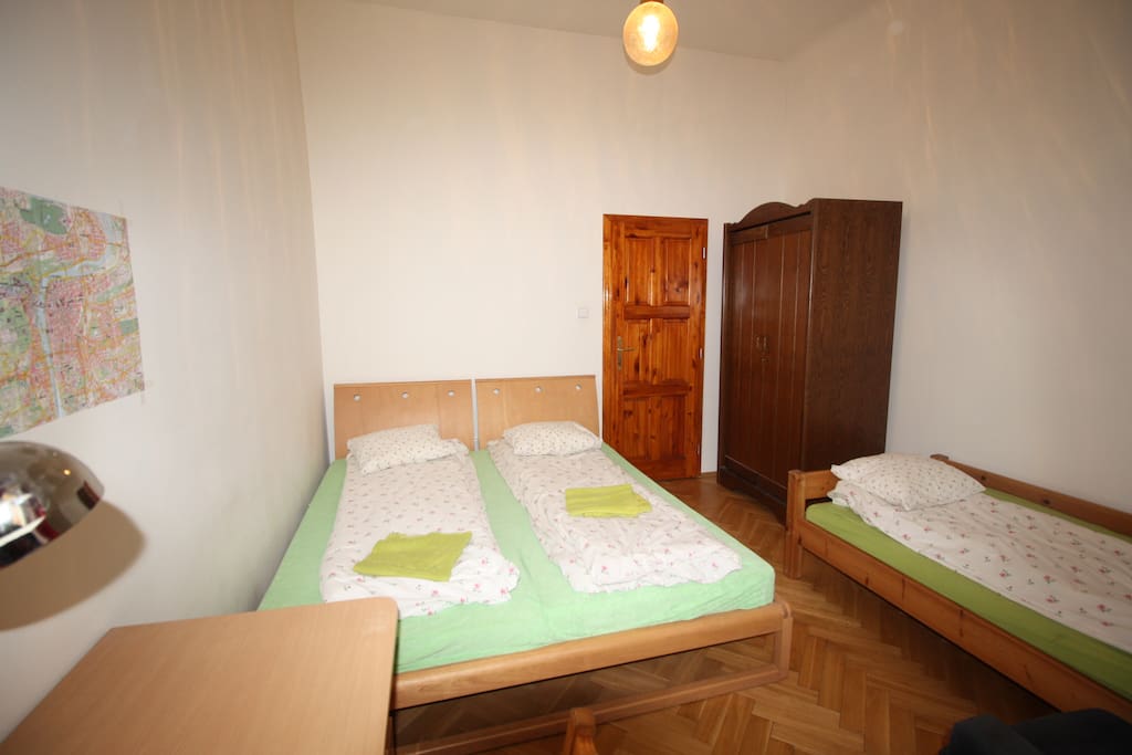 your room 3 beds , wardrobe, writing table in apartmen 3.1 A for 3 persons,
