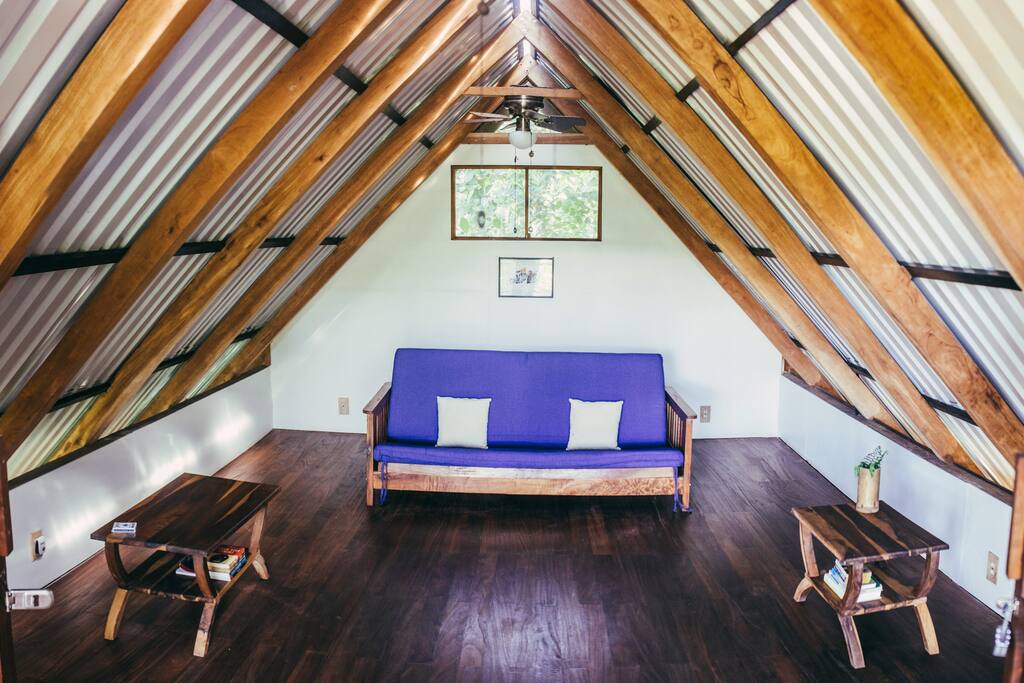 Spaious top floor lounge area, opens out onto private balcony