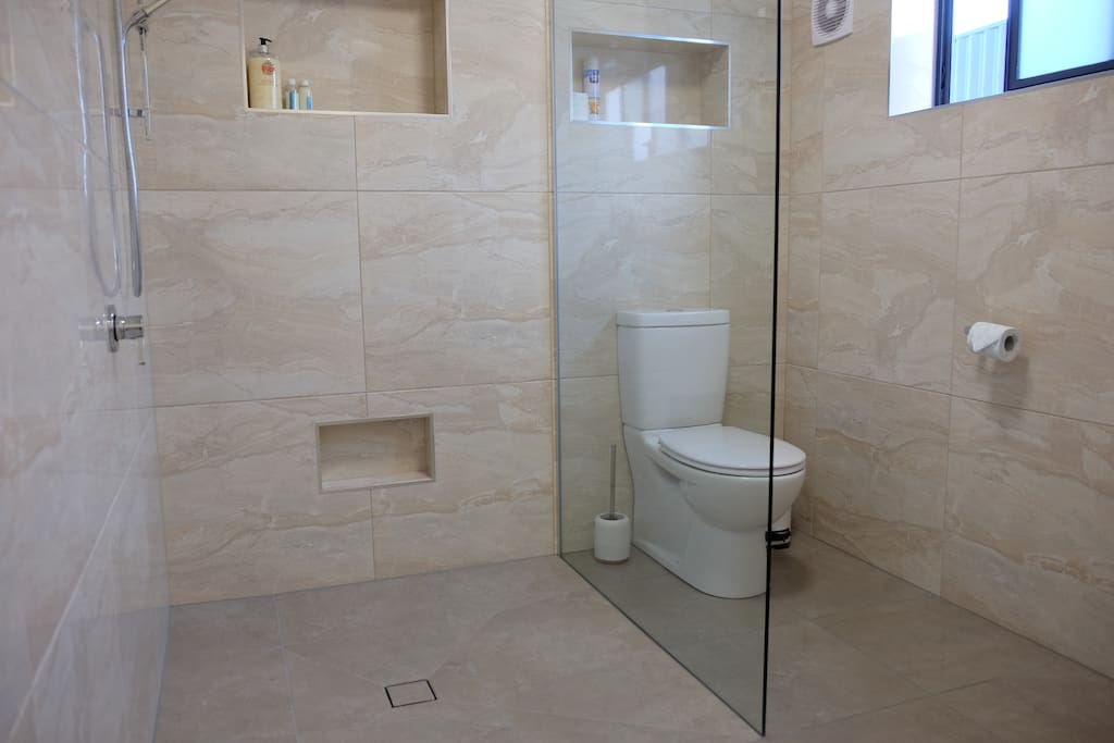 5 star luxury. Spacious. Floor to ceiling tiles. Heated floor tiles and towel rail.
Spacious shower