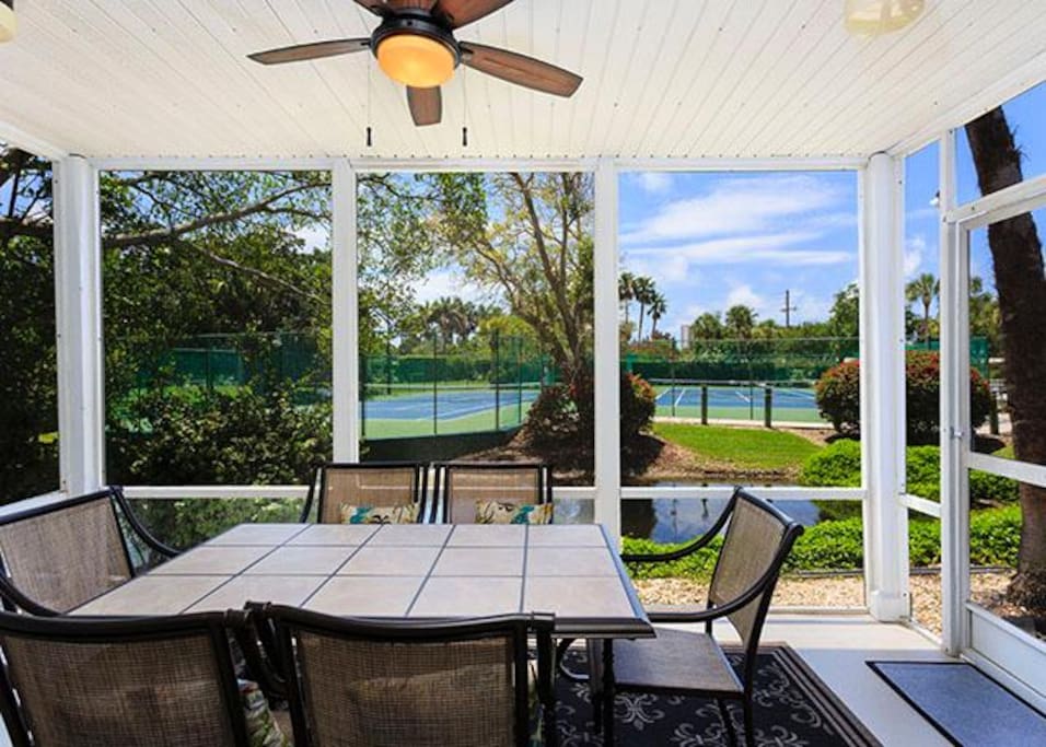 The big 11 x 16 foot lanai has breezes and great water views! - A creek runs along the edge of our back garden, bringin exotic bi