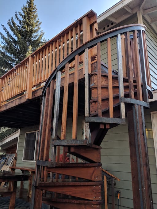 Custom Spiral Staircase leads to private balcony and entrance