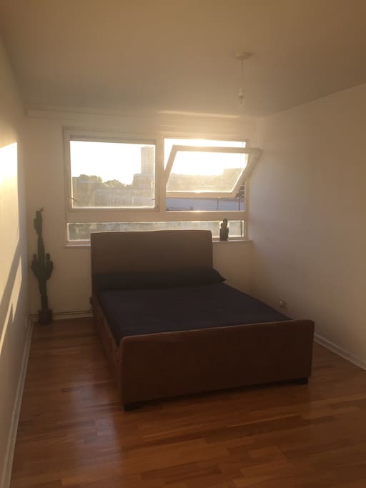 minimal double bed room with lots of space