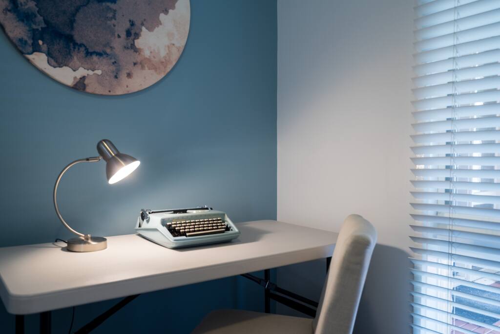 Lamp and desk space ready for you.