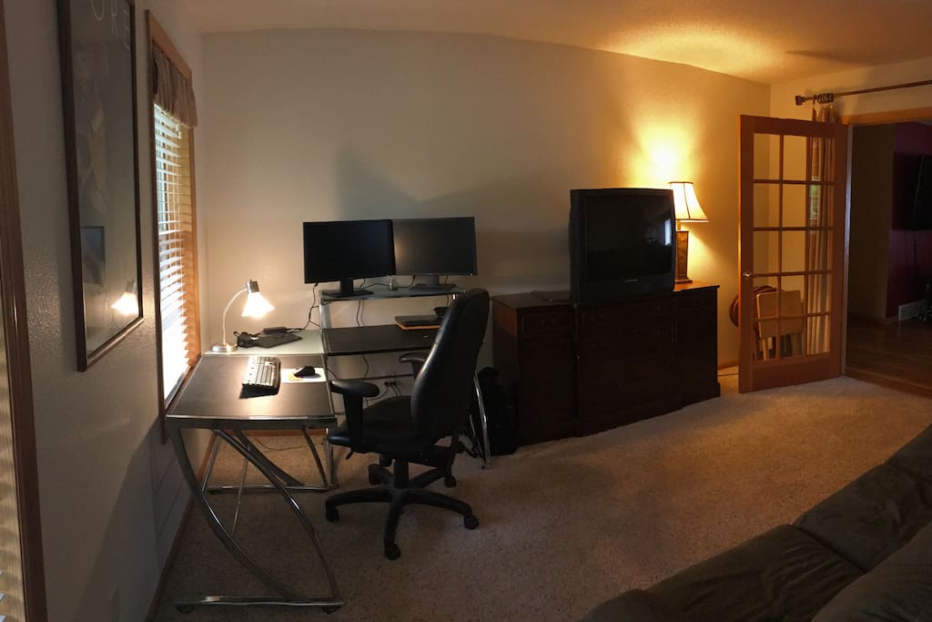 Den with workspace and pull out sofa sleeper