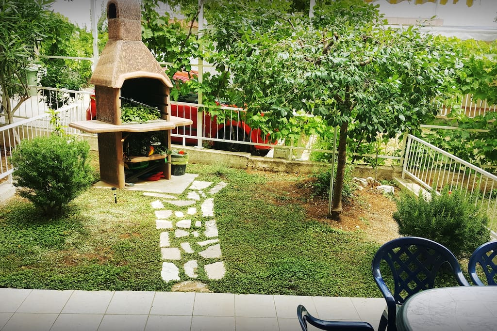 From living room and kitchen you can come at the terrace which has barbecue, dining table and deck chair. You can use rosemary from the garden to flavor your meals.